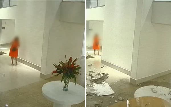Lustre e teto de gesso desabam em saguão de condomínio e quase atinge moradora; veja vídeo
